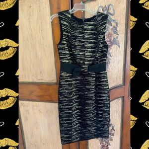 Carolina Herrera black and gold wool-blend sheath. Knee length.